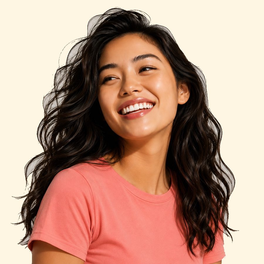 A woman smiling brightly in the sun